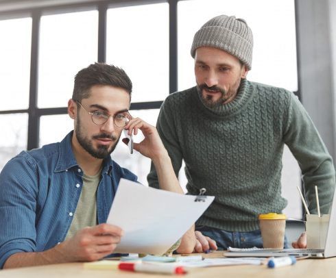 Flooring expert reviewing pricing with customer
