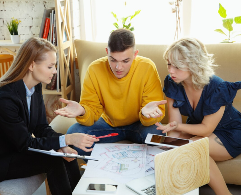 Customer discussing flooring options with his family