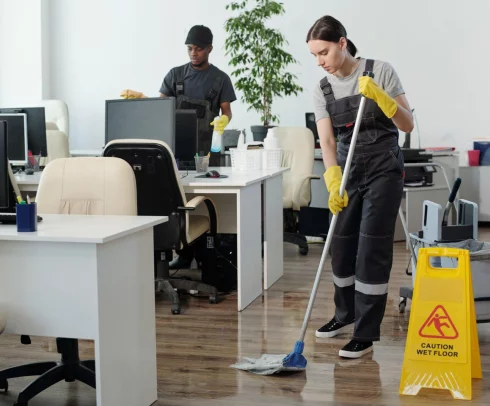 Newly installed office floors being cleaned